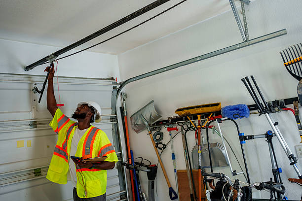 Professional Garage Door Roller Replacement technician working in Houghton, MI